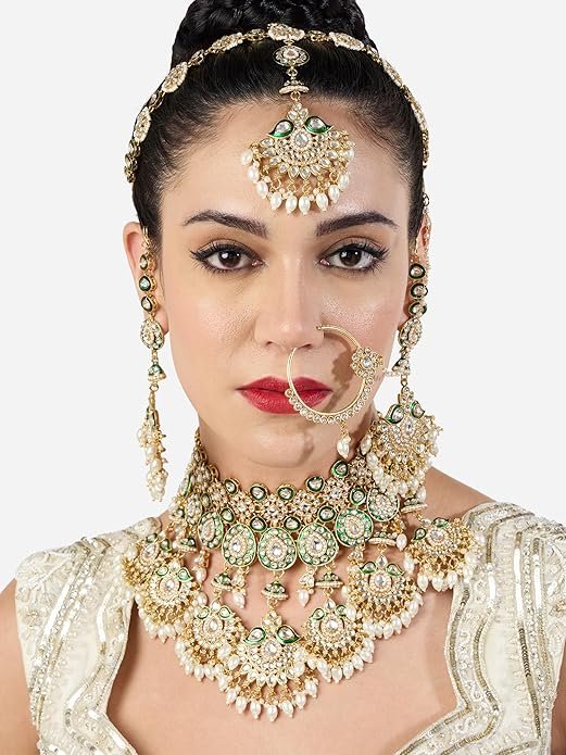 18 kt gold plated kundan bridal & semi bridal necklace set with earrings, maang tikka & nath 18 kt gold plated kundan bridal & semi bridal necklace set with earrings, maang tikka & nath