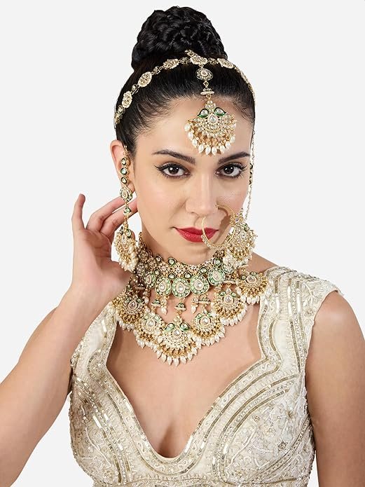 18 kt gold plated kundan bridal & semi bridal necklace set with earrings, maang tikka & nath 18 kt gold plated kundan bridal & semi bridal necklace set with earrings, maang tikka & nath